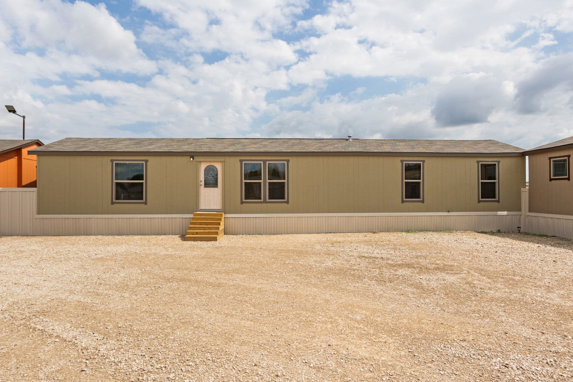 Ultra-wide 18×68-32a elevation and exterior home features