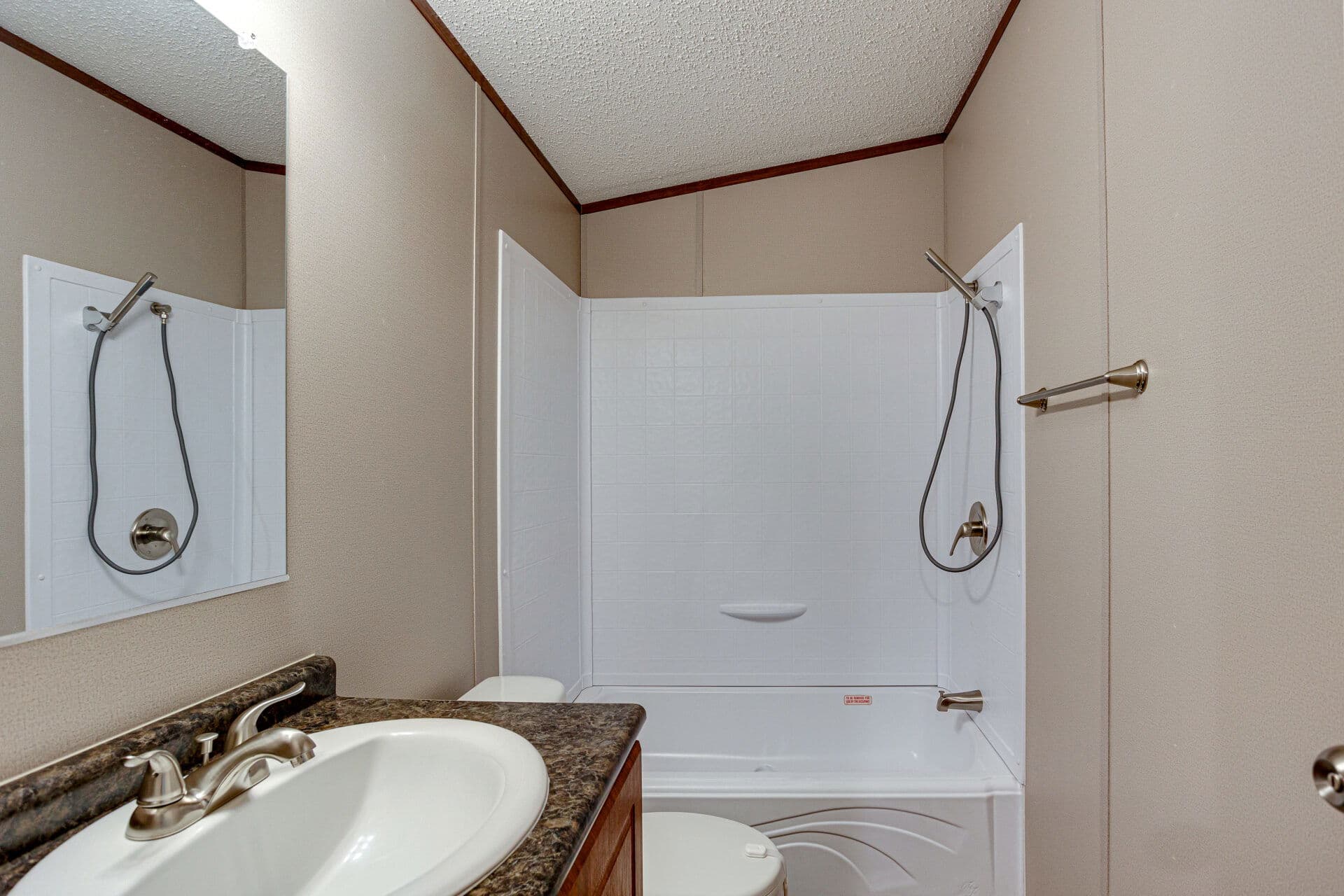 Singlewide 16×64-32c bathroom home features