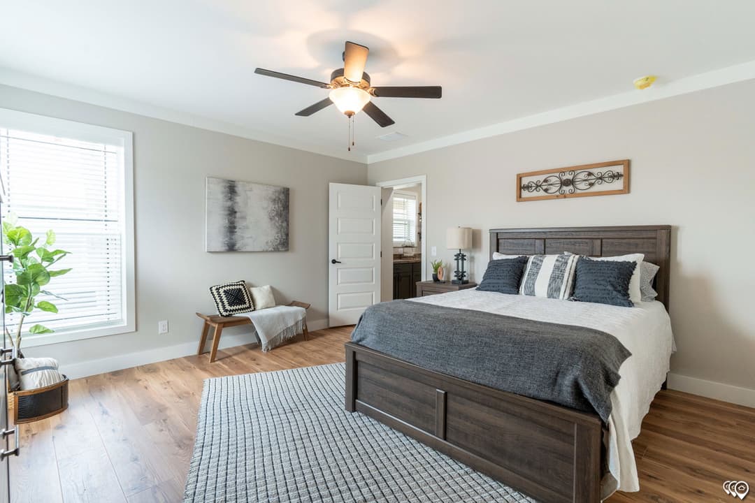 The barndominium bedroom home features